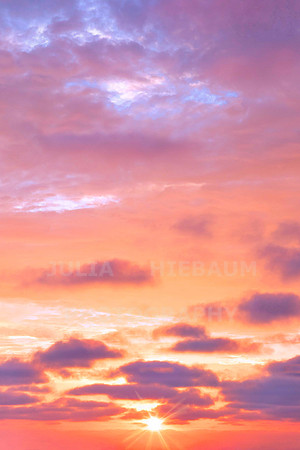 Behind the clouds
