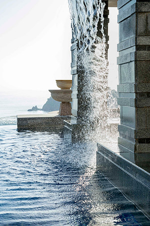 Cascading water into infinity pool, Koh-Lanta, Thailand