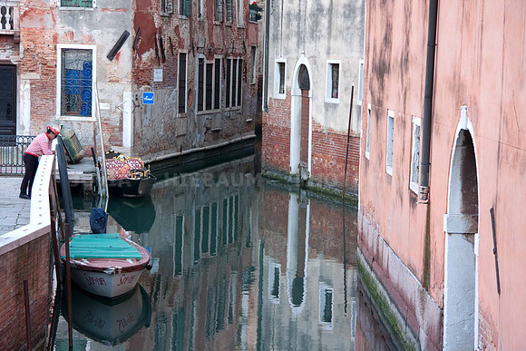 Gondolier Overlooking Rio de S. Anzolo, Venice, Italy